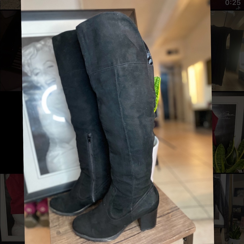 Black knee high 3 in. boots.